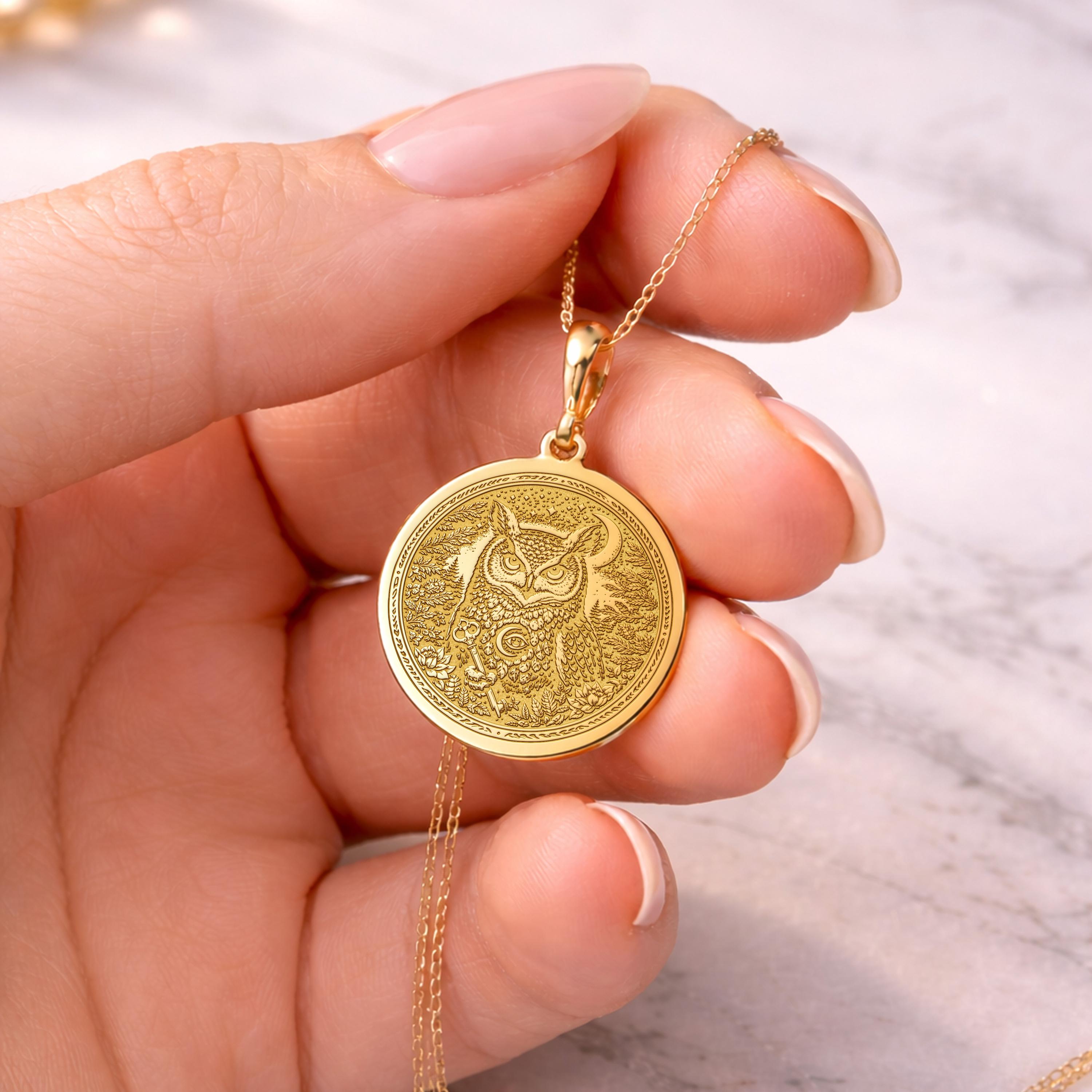 Gold owl wisdom medallion necklace with finely engraved forest details